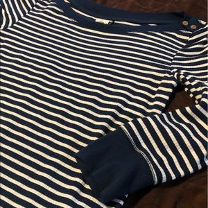 Boat neck stripped top with accent buttons.